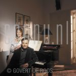 19-12-2003 Robert and Monique Schoemacher at home in Scheveningen.

[keywords]Posed: Half Length, Eyecontact, Smiling, Piano, Plastic Surgeon[/keywords]